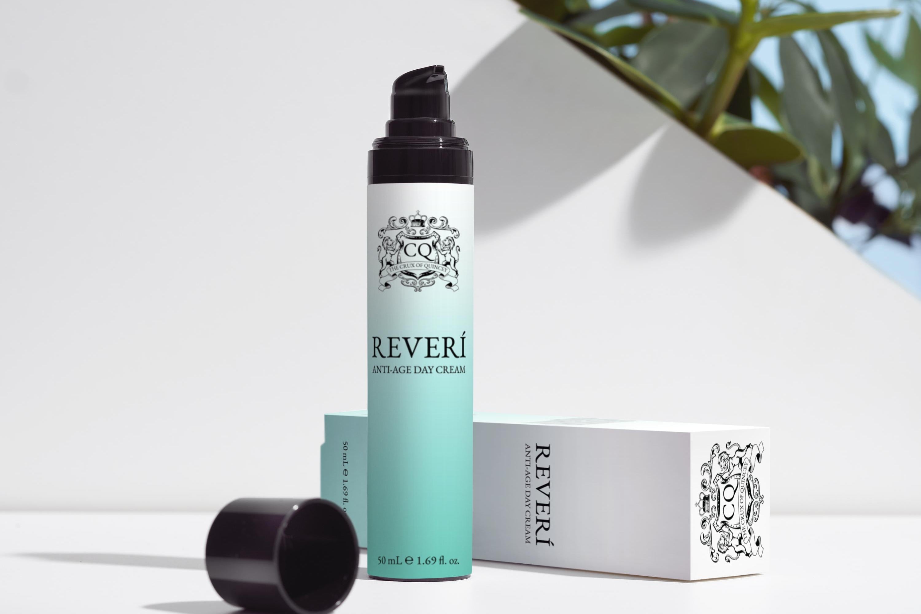 Skincare product with packaging on a white surface with greenery in the background